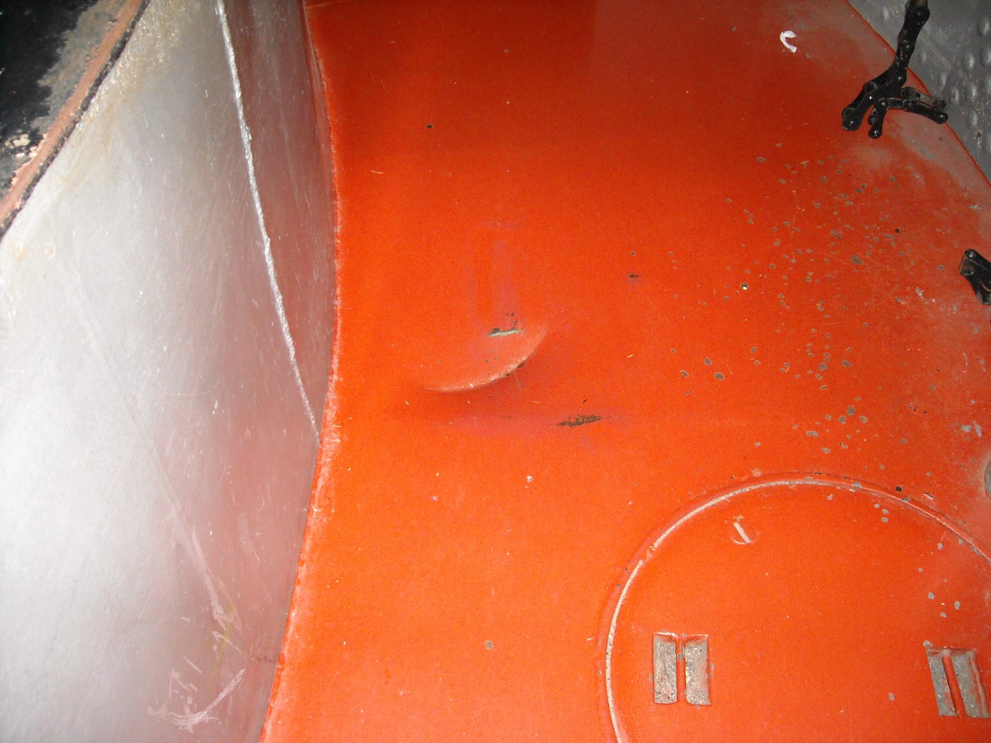 What appears to be a deck dent caused by a dropped 16-inch shell
