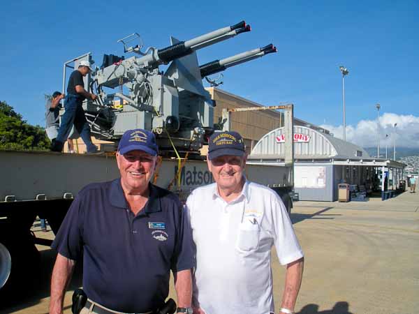 Ford Murray and a USS Missouri sailor posing proudly with the newly arrived Bofors