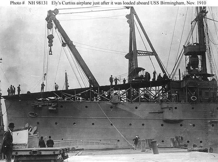 Another view of Ely's Curtiss pusher airplane on the Norfolk Navy Yard pier in preparation for his first flight