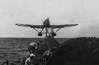 The Yokosuka E14Y Glen taking off from water with two incendiary bombs