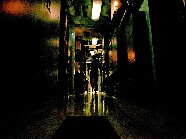 Darkened passageway through crew habitat
