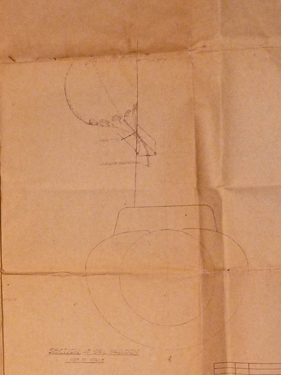 Cross section of a balloon deployed from storage recessed in the side of the submarine sail