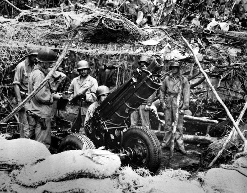 US Marines man a 75mm gun on Guadalcanal Island October 1942